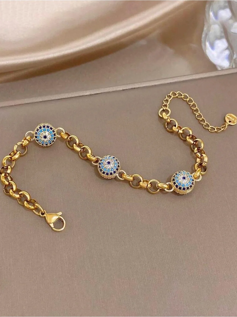 Gold-Tone Bracelet with Blue and White Crystal Discs